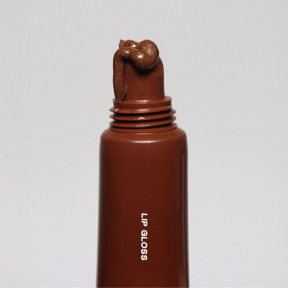 Lip Gloss Toasty Glow .